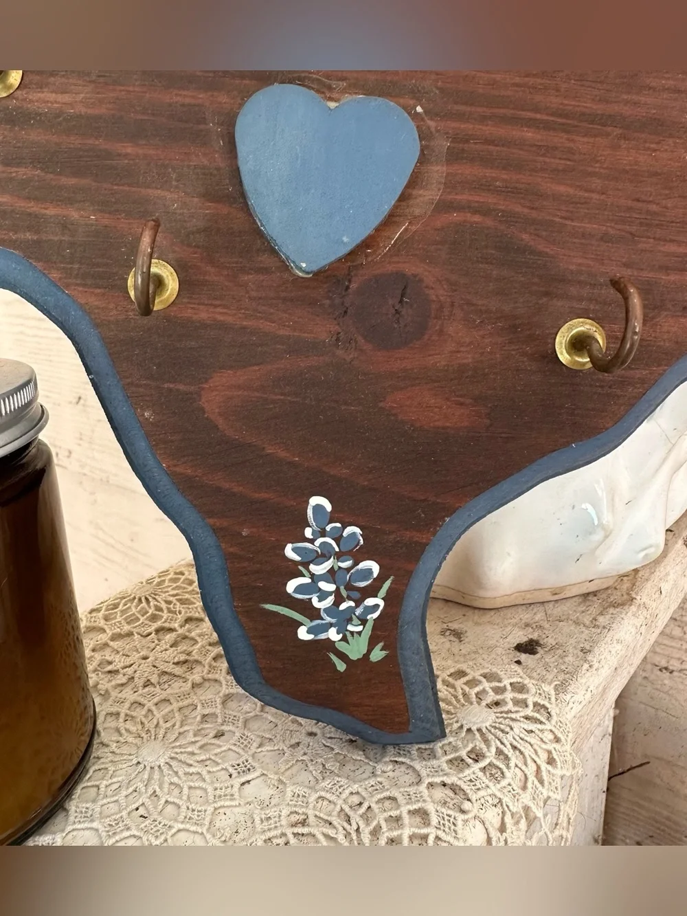 Handcrafted wooden Texas key holder with painted bluebonnet accents & blue heart